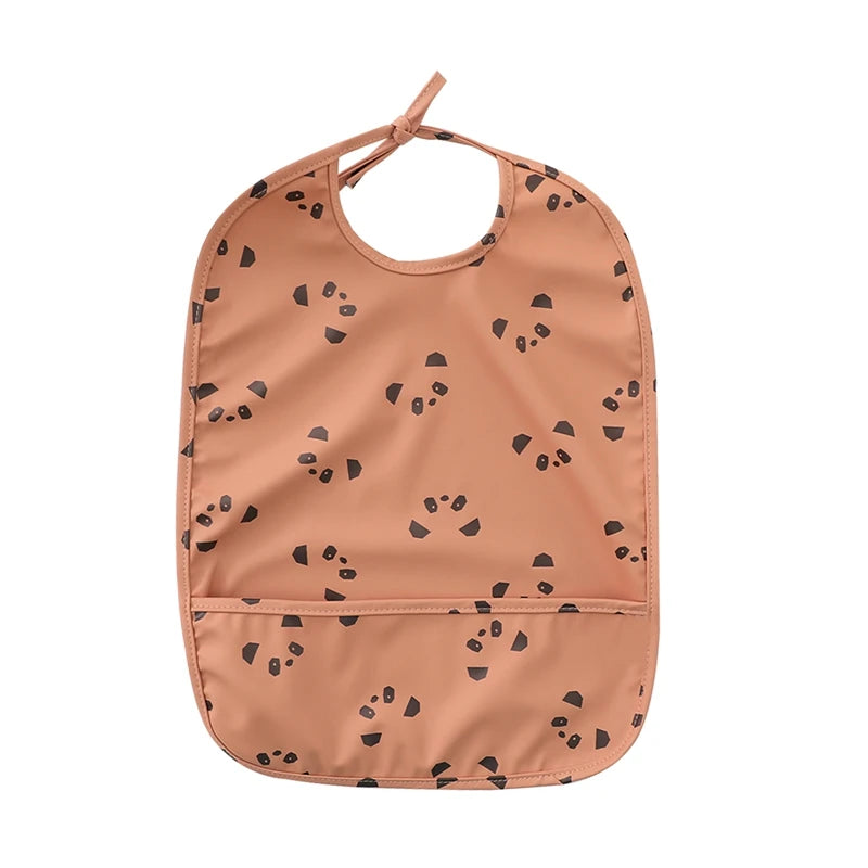 Babador Impermeável Infantil com Bolso Coletor Ajustável Estampas Variadas Unissex